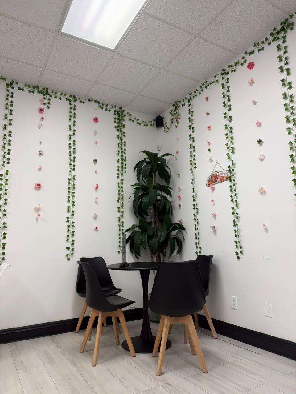 SuperBoba Tea flower wall seating corner